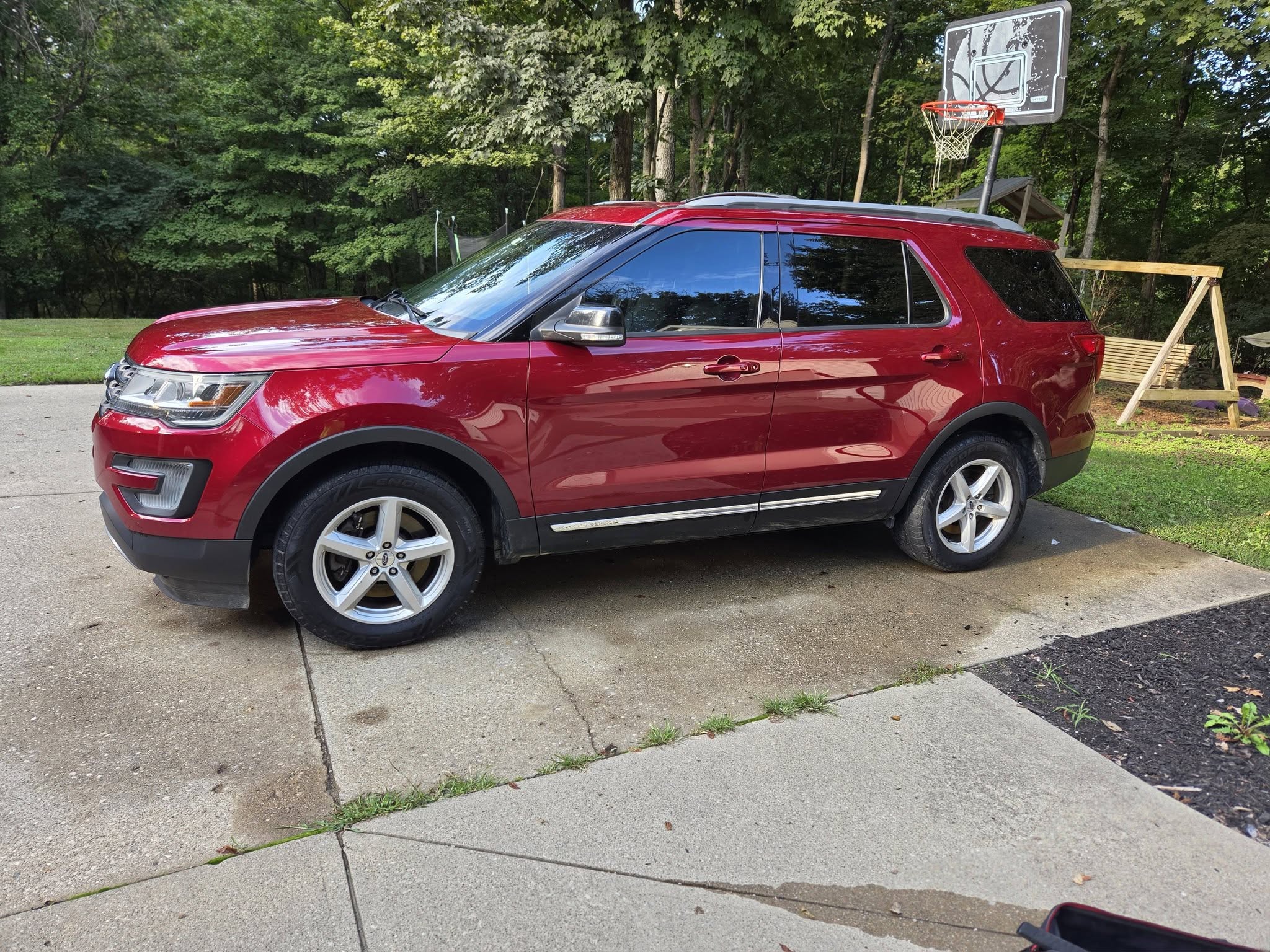 Red Ford Explorer exterior after detailing