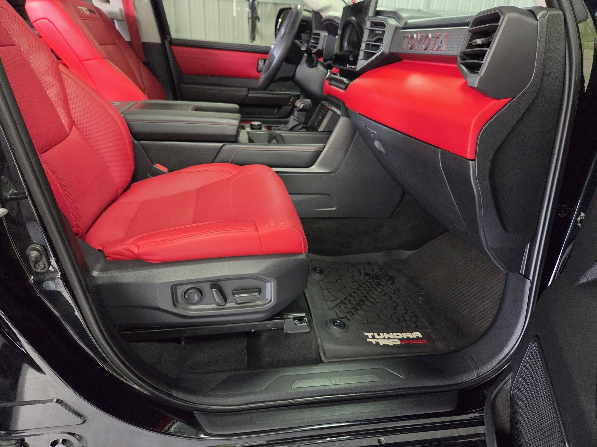 Clean red leather interior in a Toyota Tundra TRD Pro